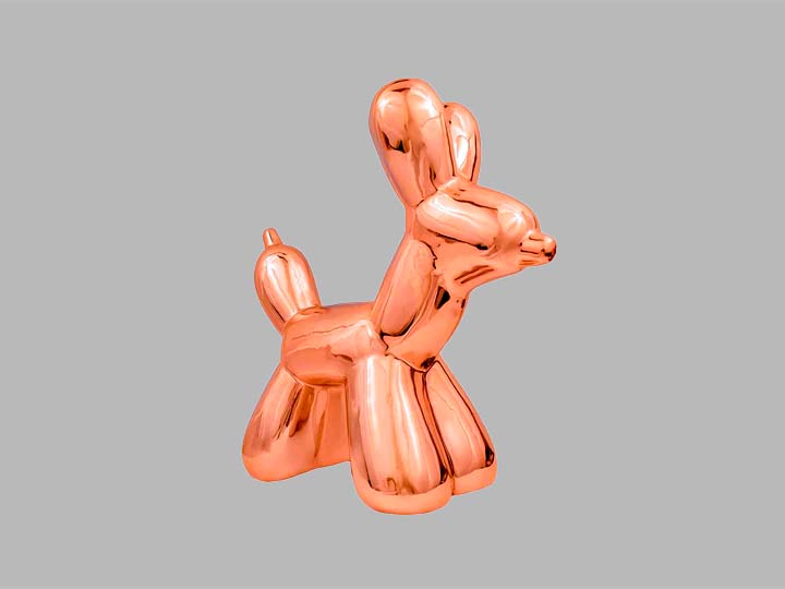 Figura de ornato de cerámica en forma de perro globo en color coral